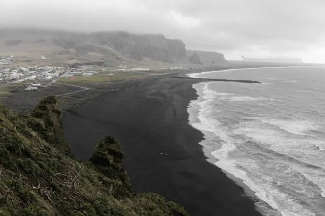 Dark Sands and Roaring Waves: The Magic of Reynisfjara Beach - Travel Guide Image