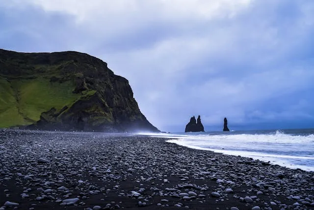 Dark Sands and Roaring Waves: The Magic of Reynisfjara Beach - Travel Guide Image